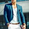 High fashion look.Young stylish confident happy handsome  businessman model man in blue suit cloth lifestyle in the street
